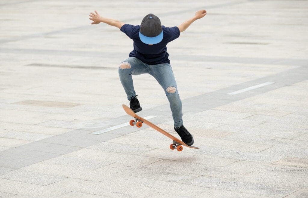 Skateboarder skateboarding outdoors in the morning